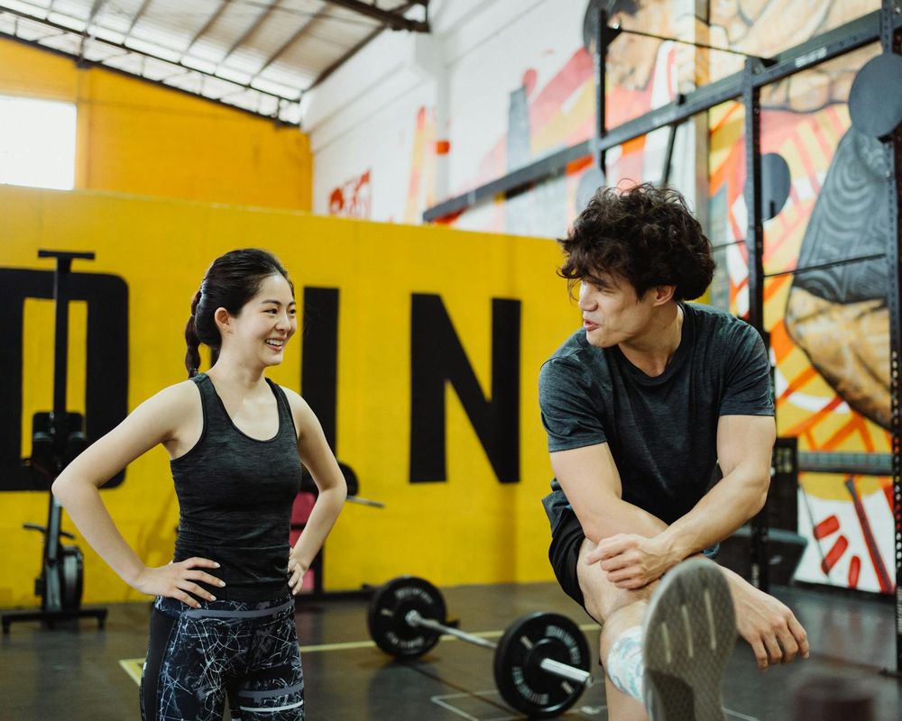 Modern equipment for cardio and stretching in a clean studio.